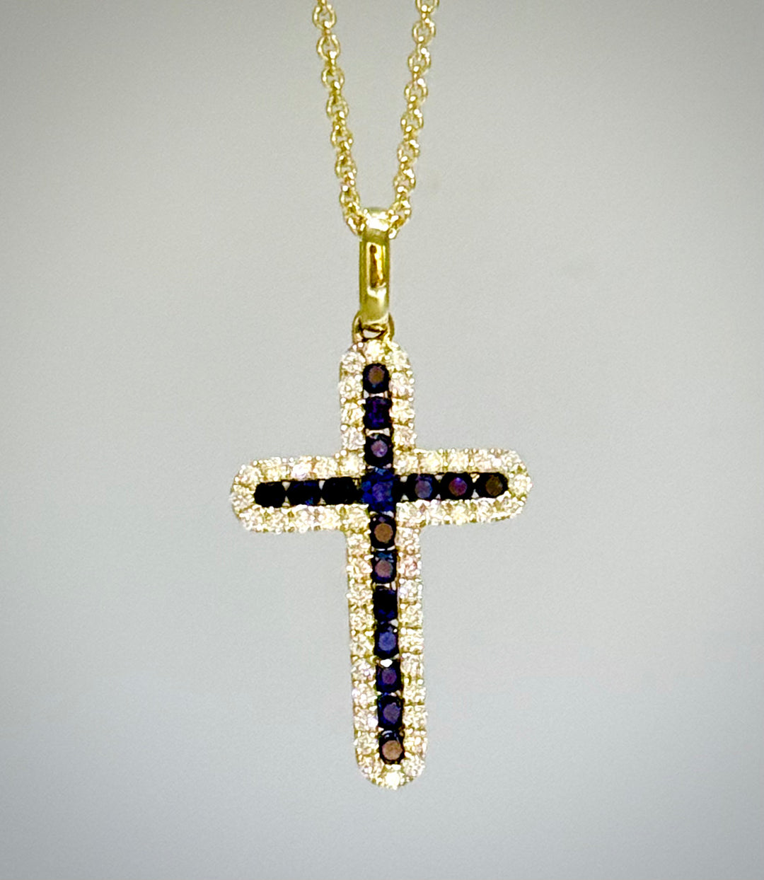 18 karat Sapphire Rounded Cross