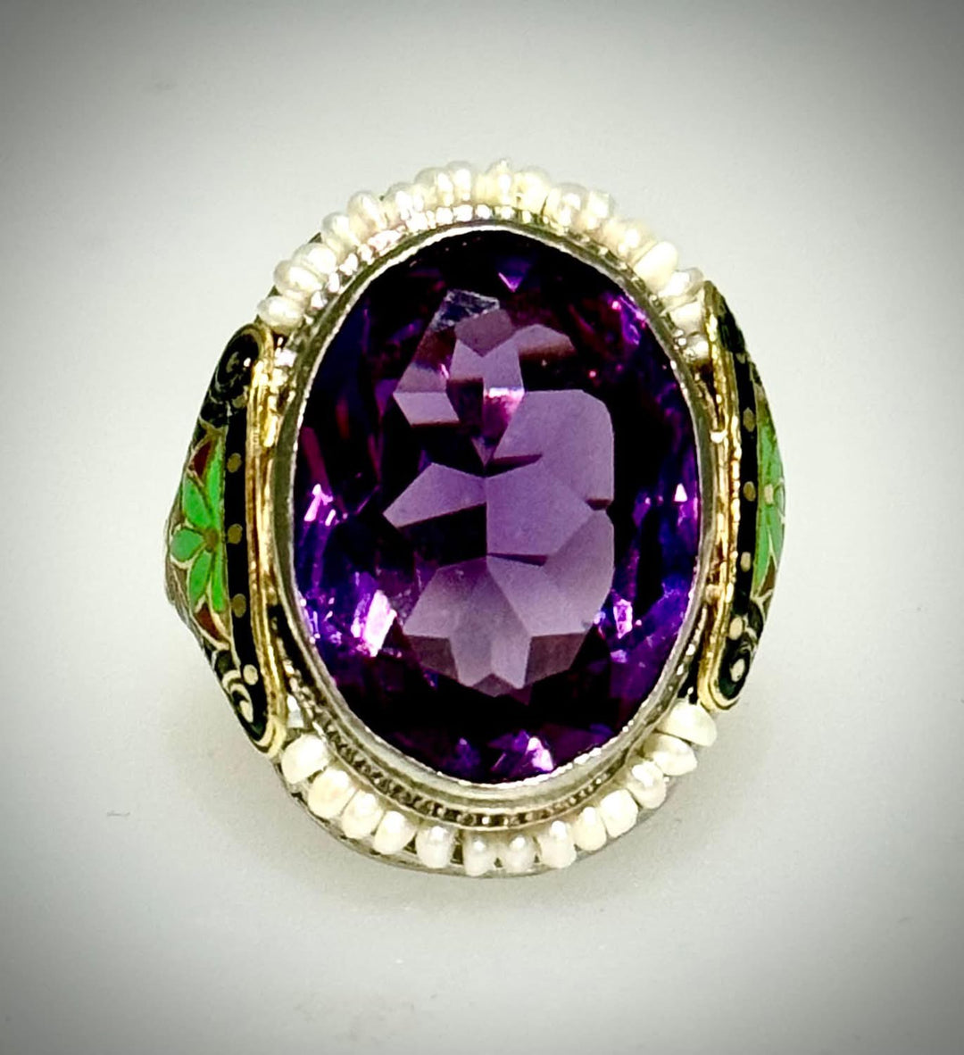 Oval Amethyst with Seed Pearl Boarder with Enamel Sides of Green and Red Ring